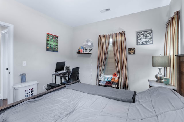 bedroom featuring wood-type flooring