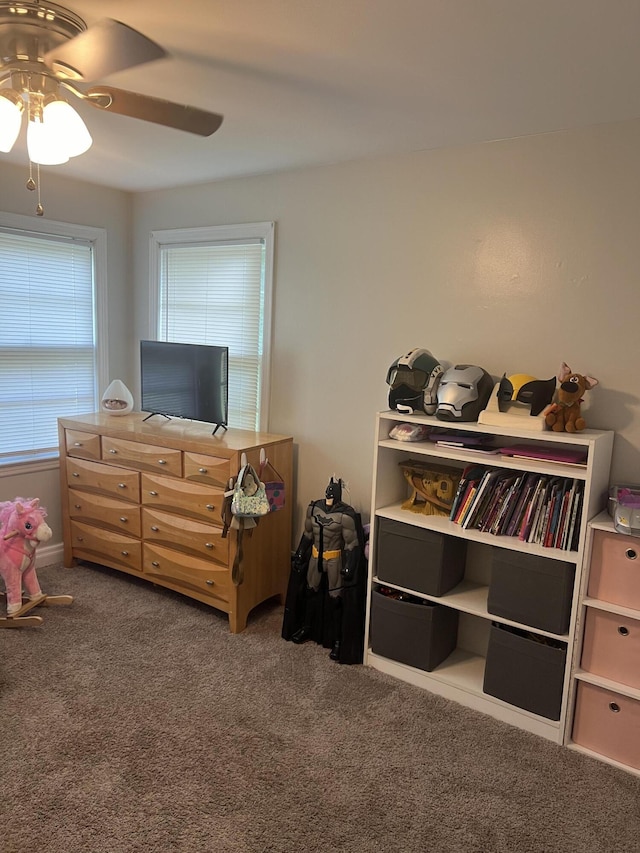 carpeted bedroom with ceiling fan