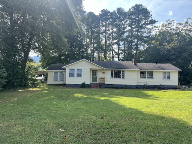 single story home with a chimney, crawl space, and a front lawn