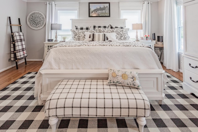 bedroom featuring dark hardwood / wood-style floors