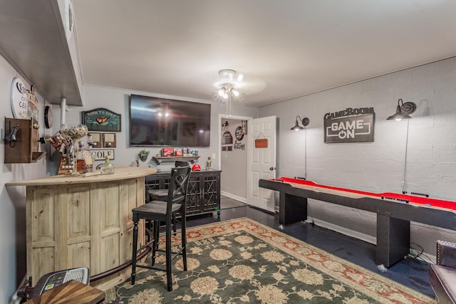 recreation room with bar area