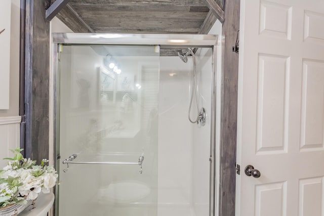 bathroom featuring an enclosed shower