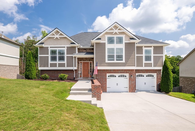 view of front of property featuring a garage and a front lawn