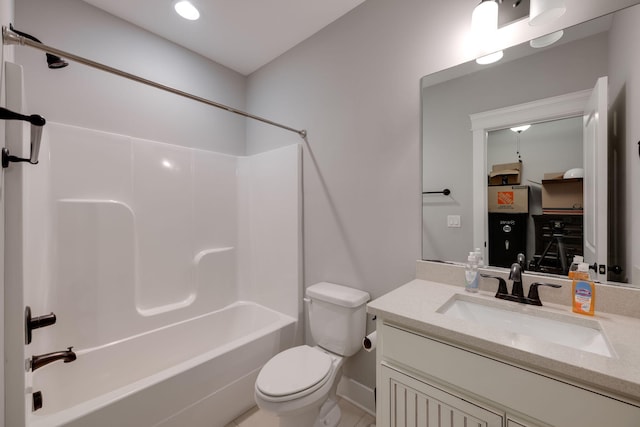 full bathroom featuring washtub / shower combination, toilet, and vanity