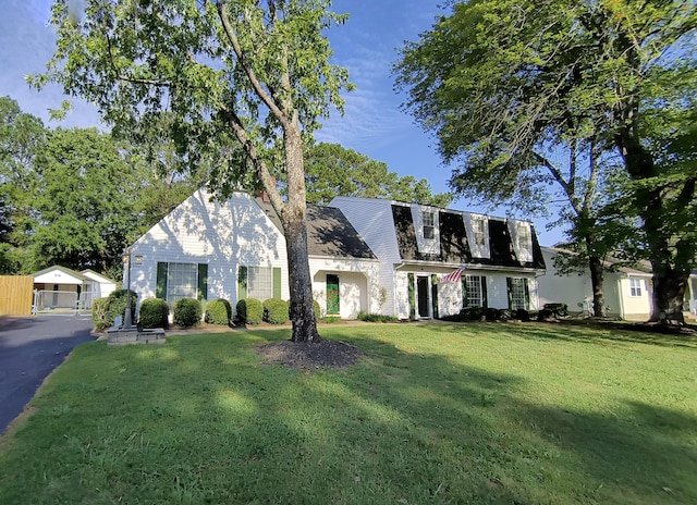 view of front of home with a front yard