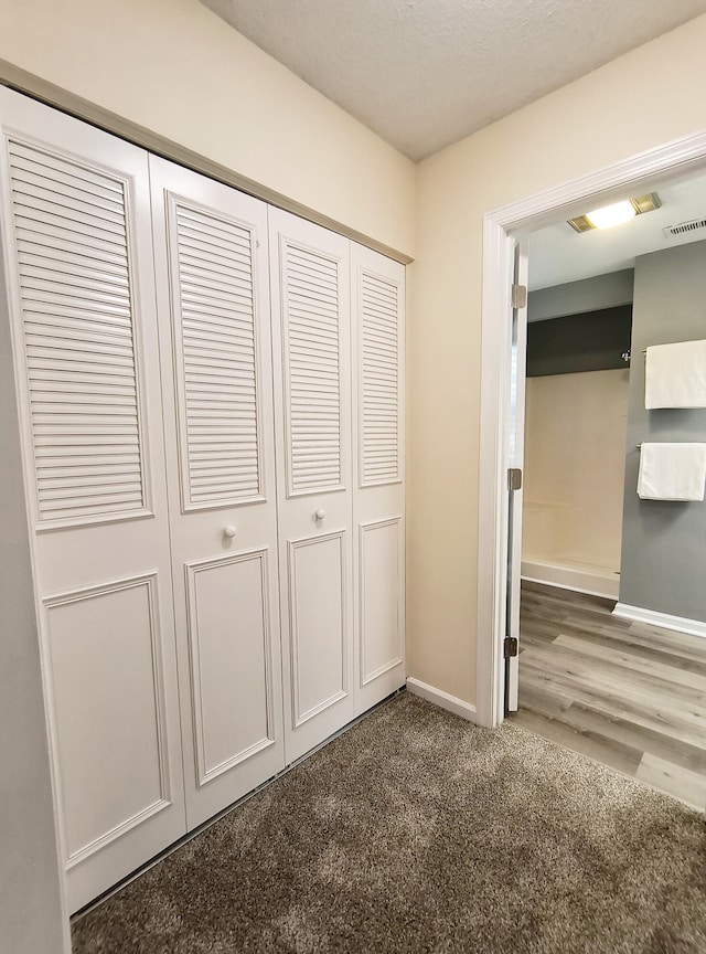 unfurnished bedroom with a closet