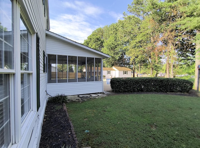 view of yard featuring a sunroom