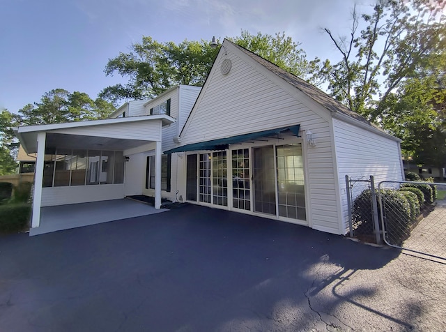 back of property featuring a patio area