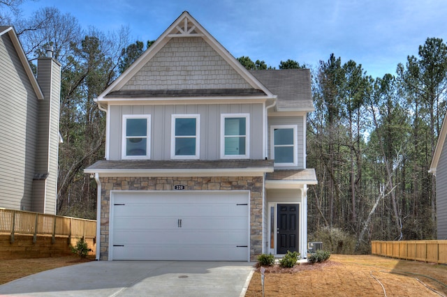 craftsman-style home with a garage