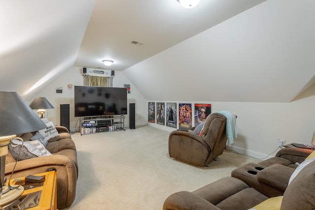 living room featuring lofted ceiling and carpet floors