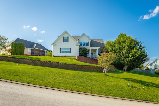 view of front of home with a front lawn