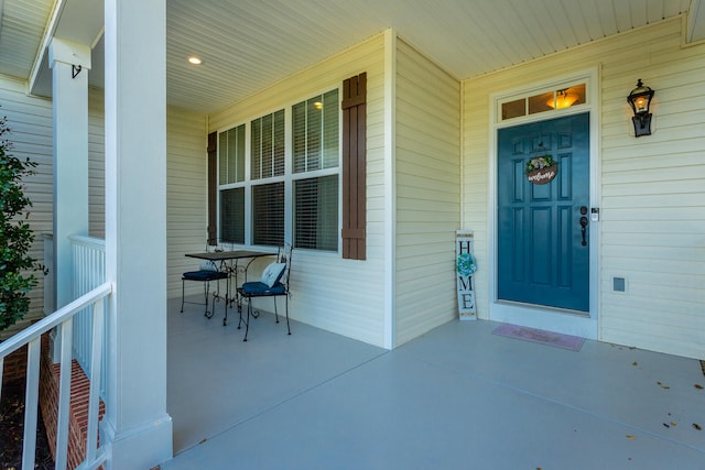 doorway to property with a porch