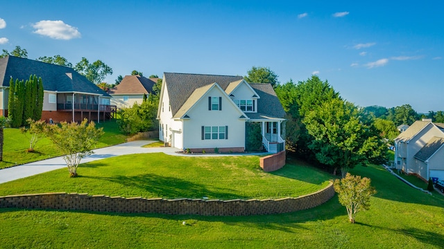 exterior space with a garage and a lawn