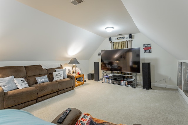 living room with lofted ceiling and carpet