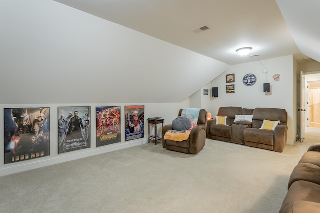 living room with carpet and vaulted ceiling