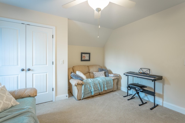 carpeted bedroom featuring vaulted ceiling, a closet, and ceiling fan