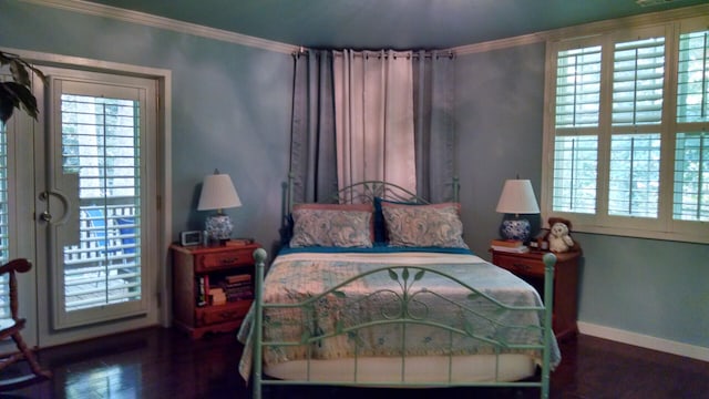 bedroom featuring crown molding and hardwood / wood-style floors