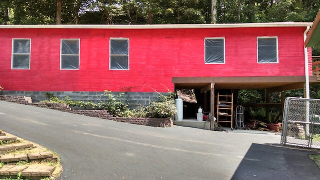 view of front facade with a carport