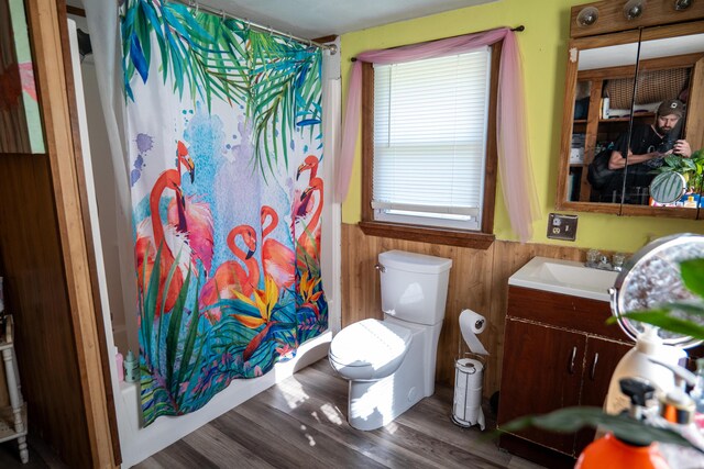3906 Kellys Ferry Rd, Chattanooga, TN 37419 - bathroom with vanity, toilet, wood finished floors, and shower / tub combo with curtain