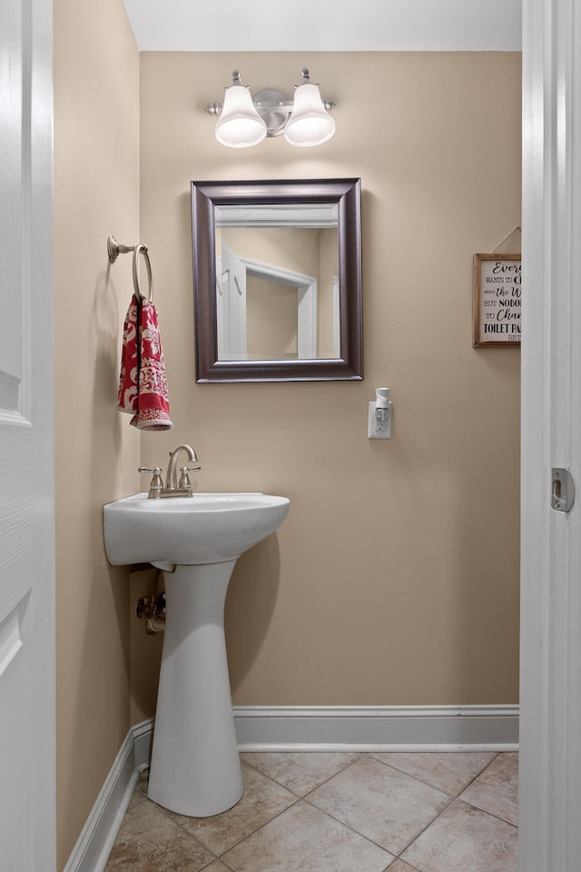 bathroom with tile patterned flooring