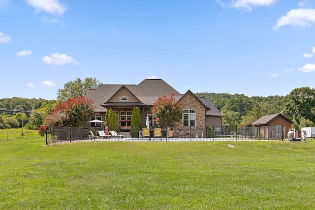 view of front facade featuring a front yard