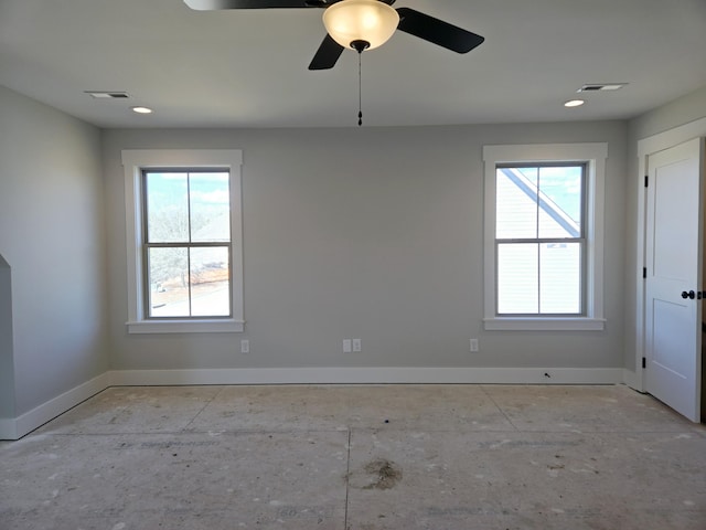 spare room with ceiling fan