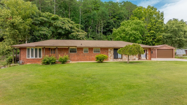 ranch-style home featuring a garage and a front lawn