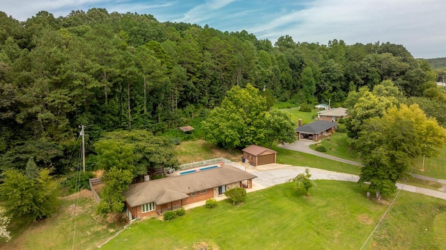 aerial view featuring a view of trees