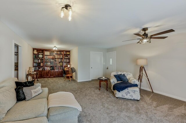 living room featuring ceiling fan and light carpet