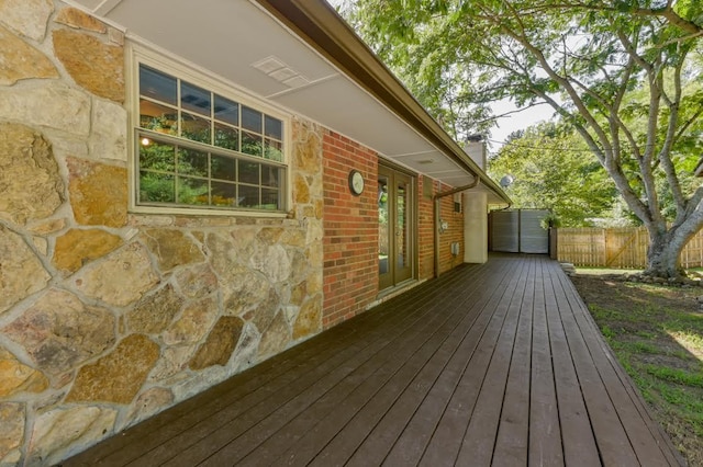 wooden deck featuring fence