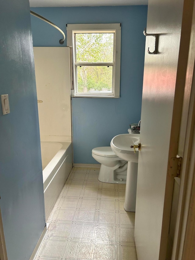 bathroom with  shower combination and toilet