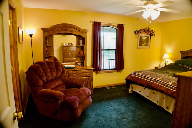 bedroom featuring ceiling fan and carpet floors