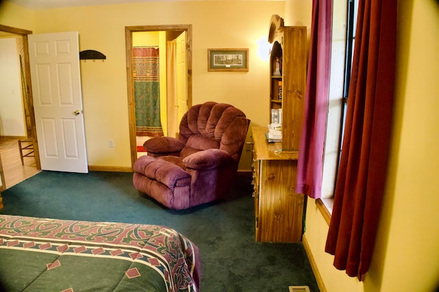 bedroom with dark carpet