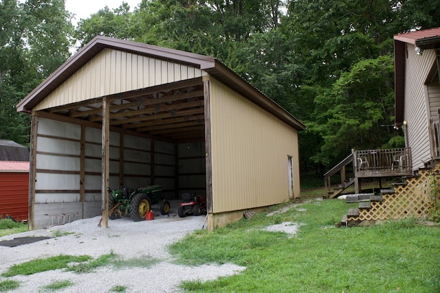 view of outdoor structure with a lawn