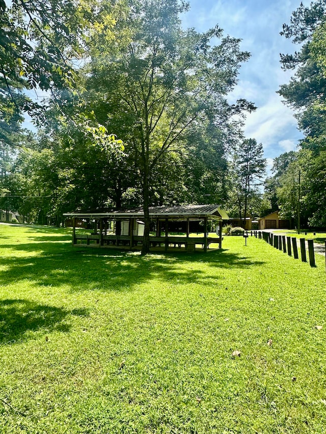 view of community featuring a lawn