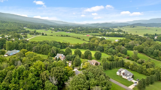 bird's eye view with a mountain view and a rural view