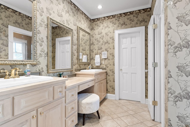 bathroom with crown molding, vanity, and tile patterned floors