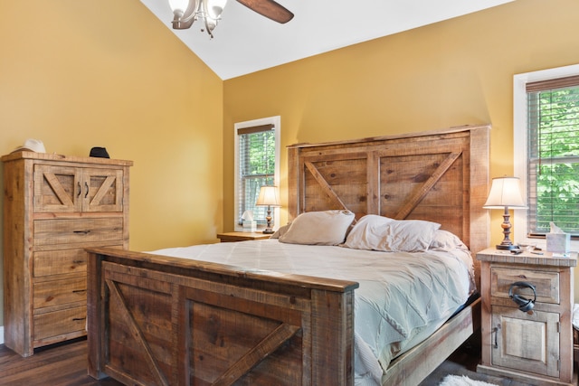 bedroom with lofted ceiling, ceiling fan, and dark hardwood / wood-style floors