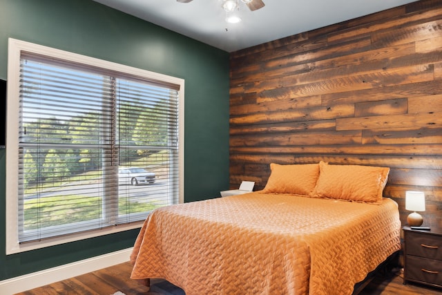 bedroom featuring hardwood / wood-style floors and ceiling fan