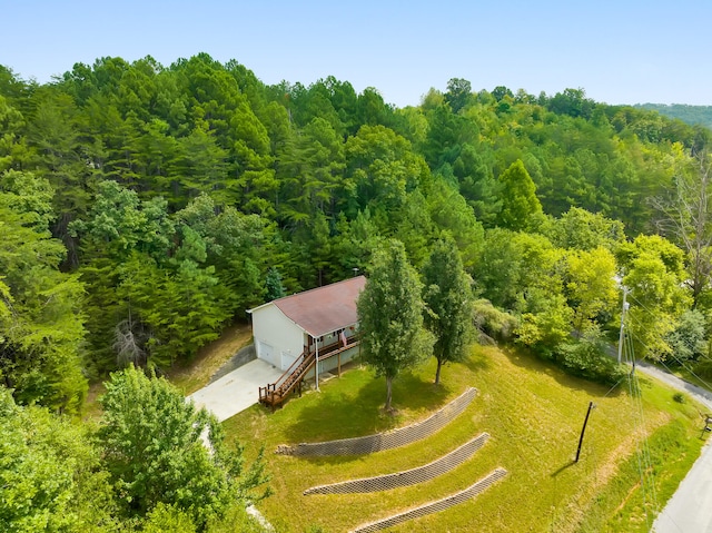 birds eye view of property with a rural view