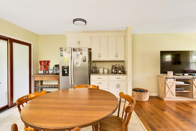 dining room featuring light hardwood / wood-style floors