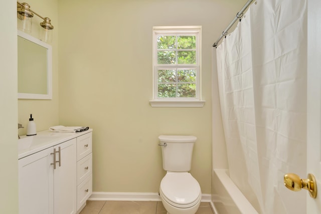 full bathroom featuring vanity, toilet, tile patterned floors, and shower / bath combo with shower curtain