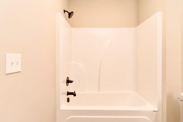 bathroom with shower / bathing tub combination