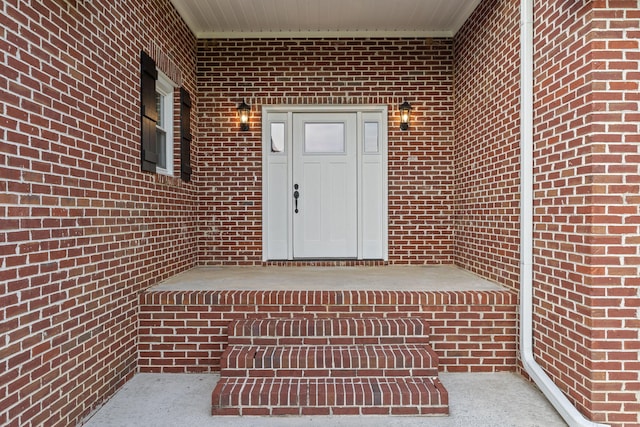 property entrance featuring covered porch