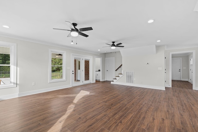 unfurnished living room featuring ceiling fan, dark hardwood / wood-style floors, and ornamental molding