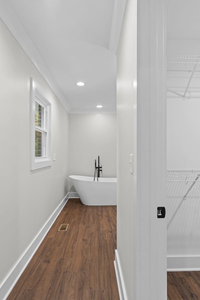 laundry room with dark hardwood / wood-style flooring