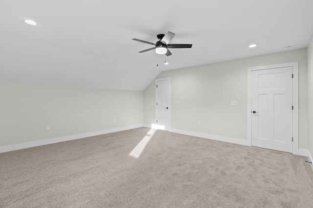 bonus room with carpet flooring, ceiling fan, and vaulted ceiling