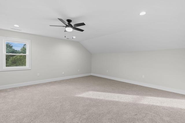 bonus room featuring lofted ceiling, ceiling fan, and carpet floors