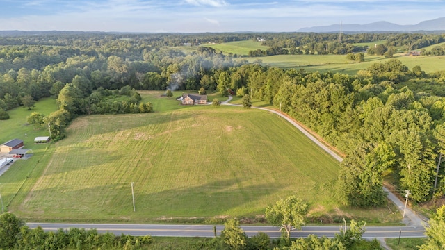 aerial view with a mountain view and a rural view