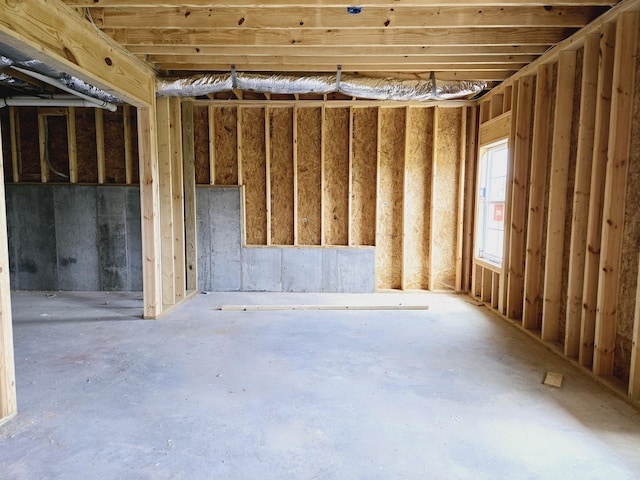 misc room with concrete floors
